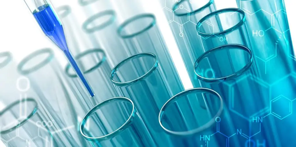 Laboratorijske epruvete i pipeta kao prikaz biotehnologije i farmaceutskih istraživanja